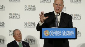 California Gov. Jerry Brown speaks as Michael Bloomberg, left, listens during a news conference at the Global Action Climate Summit Thursday, Sept. 13, 2018, in San Francisco. The Democratic Brown and former New York City Mayor Michael Bloomberg held a press conference Thursday on the first full day of the summit that is partly a rebuke of the Trump administration.
