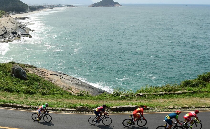 Iranian cyclist Bahman Golbarnezhad (left) competes in the Men's Road Race C4-5 at the Paralympic Games in Rio de Janeiro on Saturday.