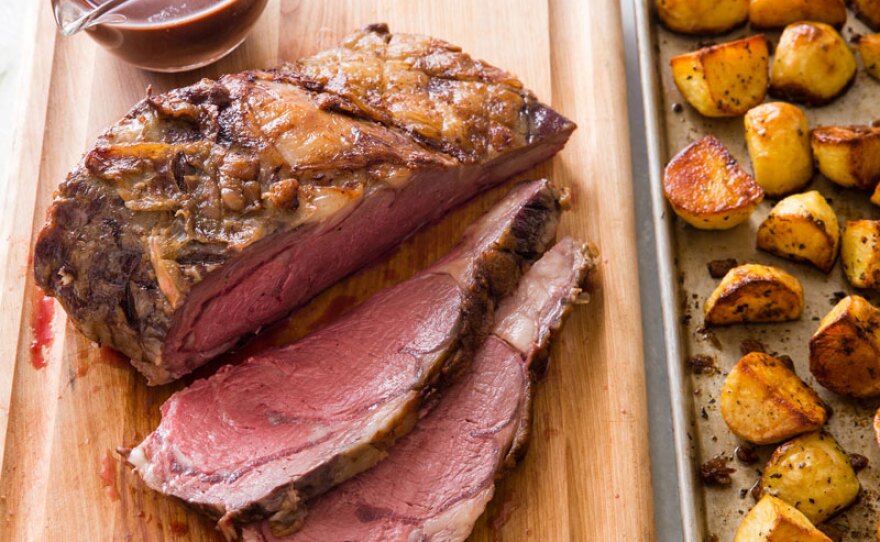 Prime Rib and potatoes with red wine-orange sauce from episode "Prime Rib with All the Fixings."