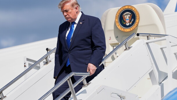 President Donald Trump exits Air Force One at Morristown Municipal Airport in Morristown, N.J., Friday, July 31, 2026, after a trip to Camp David, the presidential retreat.