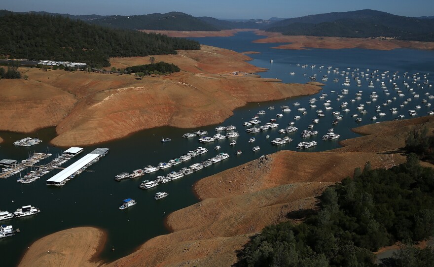 Low water levels are visible in the Bidwell Marina at Lake Oroville in August 2014.