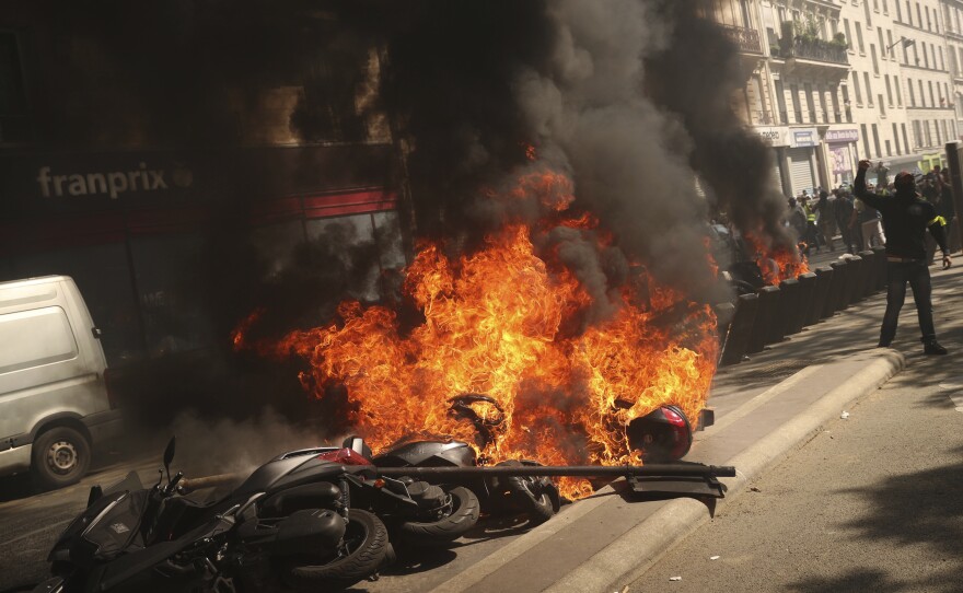 Yellow vest protesters marched — and set fires — Saturday in Paris to remind the government that rebuilding the fire-ravaged Notre Dame Cathedral isn't the only problem the nation needs to solve.