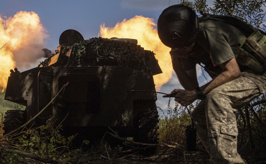 Ukrainian artillery shoots towards Russian forces at a frontline in Kharkiv region, Ukraine, Wednesday, July 27, 2022.