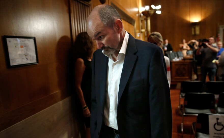 Kevin Turner, a former player in the National Football League leaves a hearing of the Senate Special Committee on Aging in 2014. He died earlier this year.