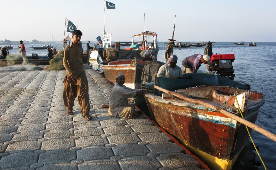 Fishermen at the harbor in Gwadar, a remote fishing town of Pakistan's southwestern coast. China is investing billions to create a large port in Gwadar and develop a transportation network that will lead to western China. It's part of the larger Chinese effort to build a modern Silk Road.