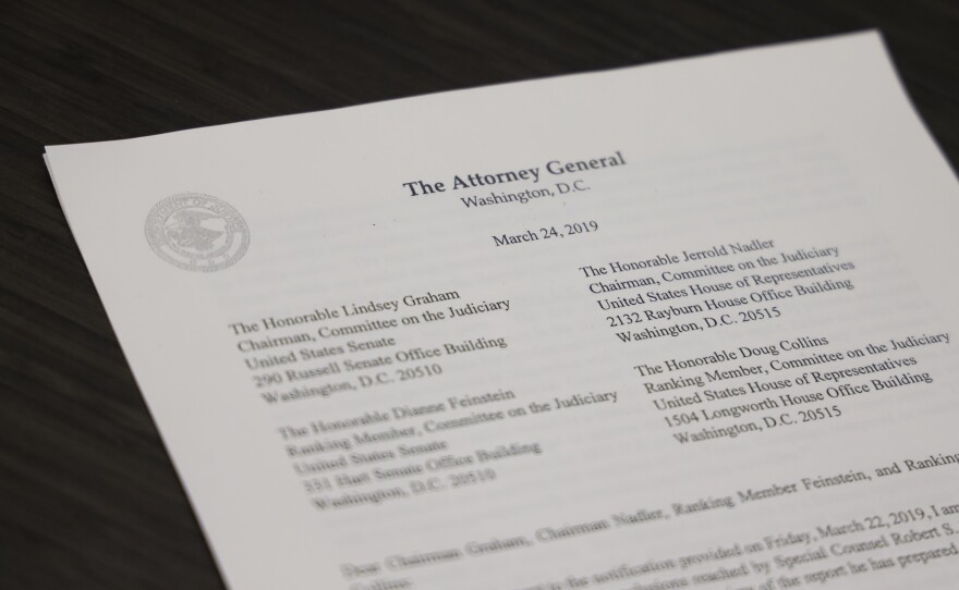 A copy of Attorney General William Barr's letter to Congress regarding the conclusion of special counsel Robert Mueller's investigation is arranged for a photograph in Washington, D.C.