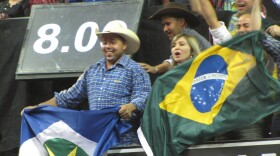 Fans from Brazil waive their flag for the Brazilian bull riders at the PBR World Finals in Las Vegas on Oct. 30.