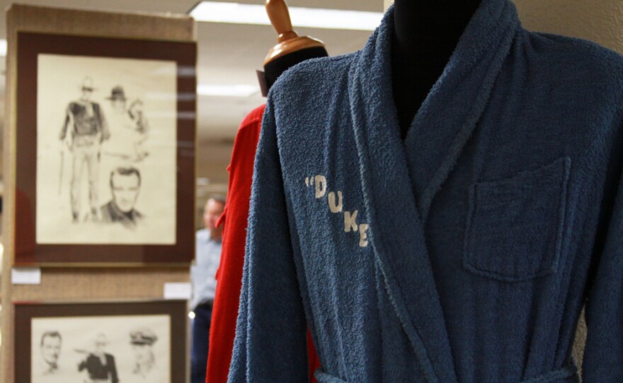<p>John Wayne's family auctioned off his bathrobes.</p>