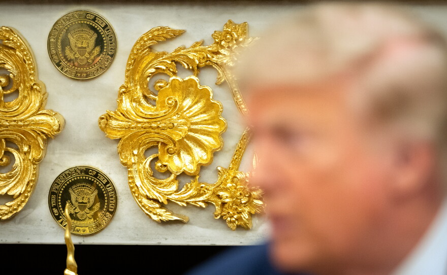Gold-colored Presidential seals are seen on a fireplace in the Oval Office as President Donald Trump meets with Lebanese President Joseph Aoun at the White House, Tuesday, July 21, 2026, in Washington.