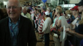 Jim Fudge, Navy veteran on Honor Flight, meets appreciative crowds at Lindbergh Field.