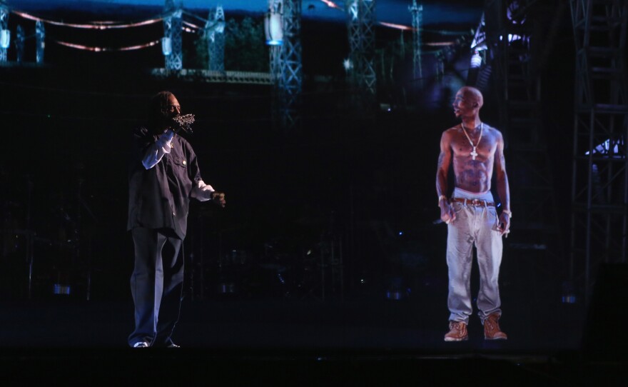 The Ghost of Tupac (right) appears next to Snoop Dogg (left) at the Coachella Valley Music & Arts Festival in 2012