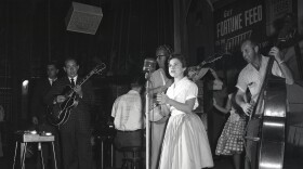 Young Brenda singing on stage with the A-Team. (undated photo)