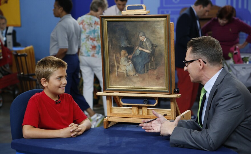 David Weiss (right) appraises a late 19th-century Albert Neuhuys watercolor in Richmond, Va. ANTIQUES ROADSHOW “Kids Stuff” airs Monday, November 3 at 8/7C PM on PBS.