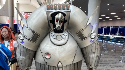 A cosplayer towered above the Comic-Con crowd as a Mondoshawan from "The Fifth Element" on July 26, 2025.