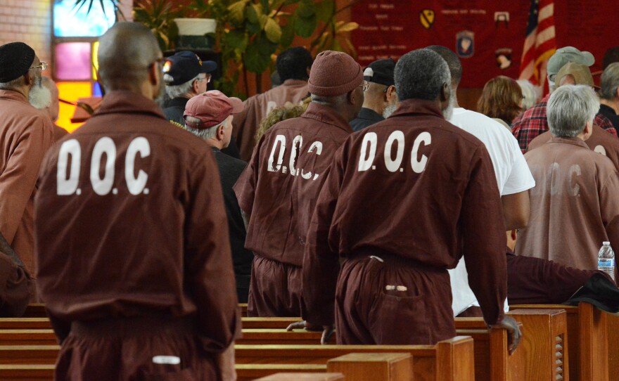 Prisoners at the now-closed Pennsylvania State Correctional Institution at Graterford, Pa., attend an event in 2015. For the redrawing of state legislative districts, Pennsylvania is set to reallocate certain counts of people held in state prisons to their last known addresses if they were living in the state immediately before they were incarcerated.