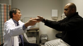 Dr. Alex Dromerick co-directs the Brain Research Center at the National Rehabilitation Hospital. Here he observes Stephen Jones, a policeman who was involved in a motorcycle accident.