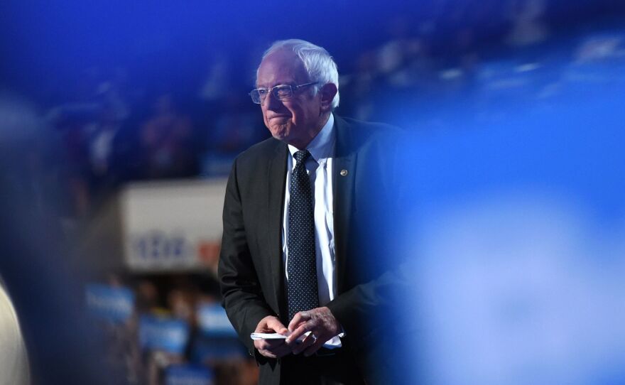 Sen. Bernie Sanders takes the stage on the first evening of the Democratic National Convention in Philadelphia on Monday.