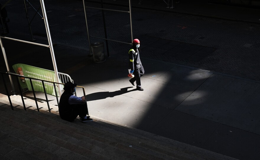 A lonely walk through pandemic New York streets echoes the isolation many Americans are feeling in their battle against a virus that has wreaked multiple, continuing traumas — with no end in sight.