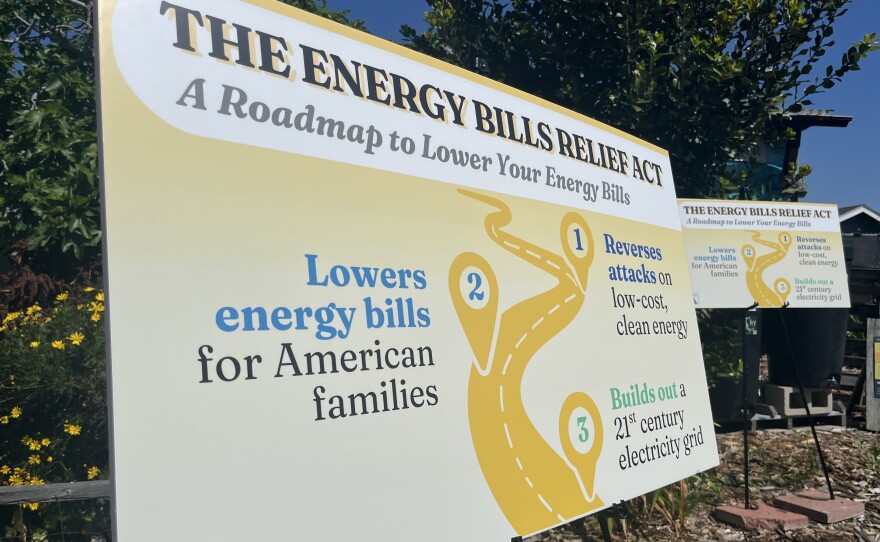 A sign detailing the Energy Bills Relief Act stands at the Solana Center for Environmental Innovation in Encinitas, March 23, 2026.