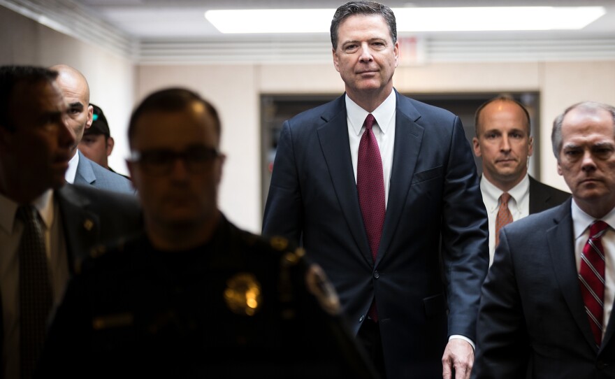 Former FBI Director James Comey leaves a closed session with the Senate intelligence committee on Capitol Hill June 8, 2017, in Washington, D.C.