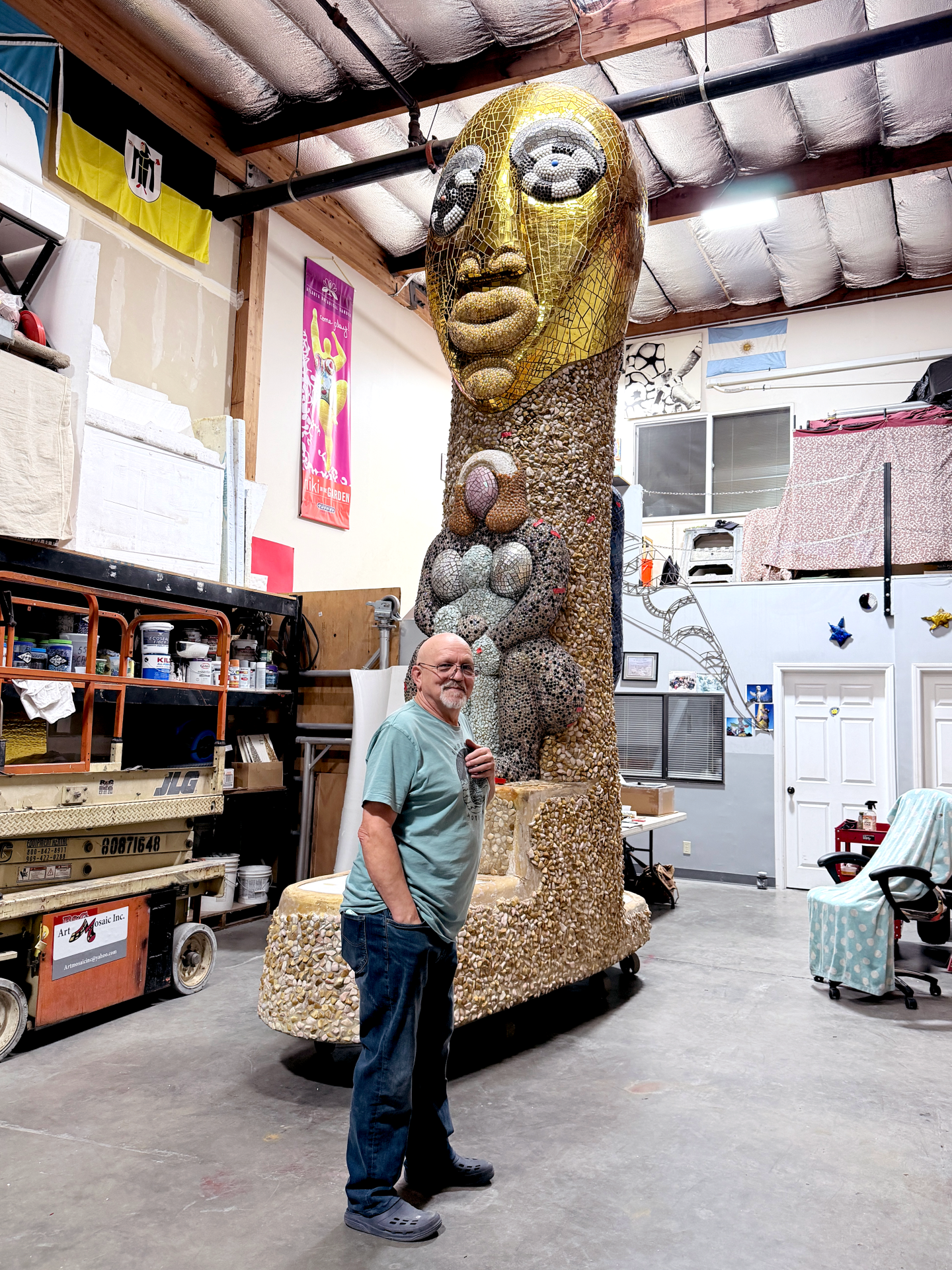 Lech Juretko stands in front of Niki de Saint Phalle's Grand Step Totem sculpture at his workshop in Santee, Calif., on Jan. 16, 2026.