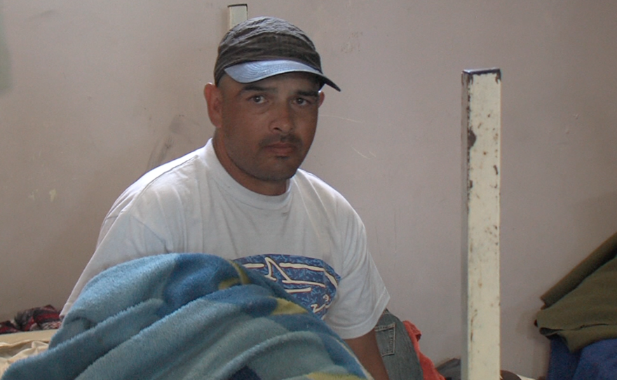 A resident at the Tijuana rehabilitation center DAR sits on his bed, May 1, 2015.