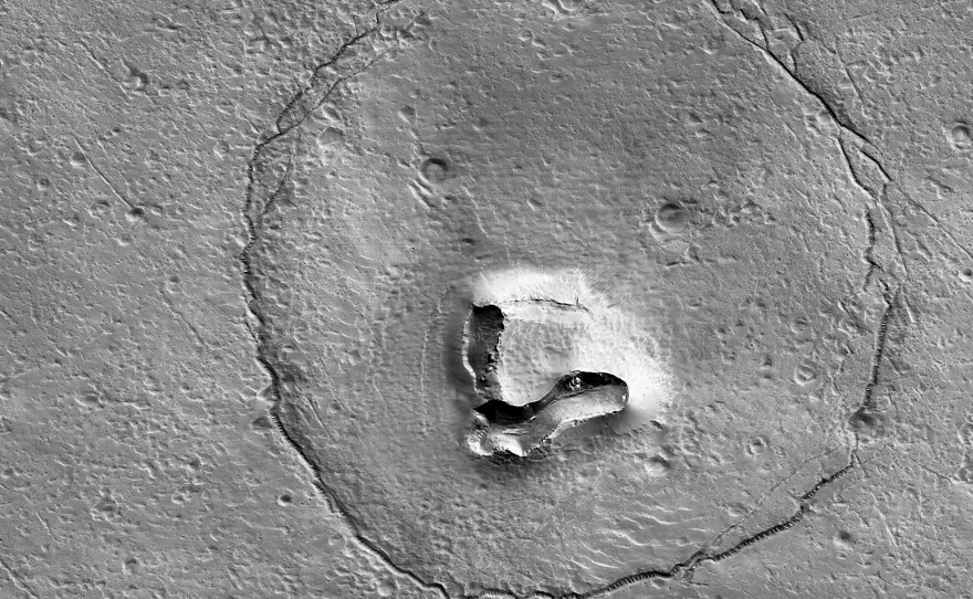 The University of Arizona shared an image, pictured, of a formation on Mars that resembles a bear.