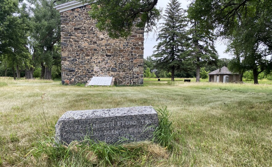 A century-old marker sits in front of the historic Stone Warehouse, which played a critical role in the U.S.-Dakota wars. The Lower Sioux Indian Community is putting up new markers to tell that story and many others on land the tribe now manages.
