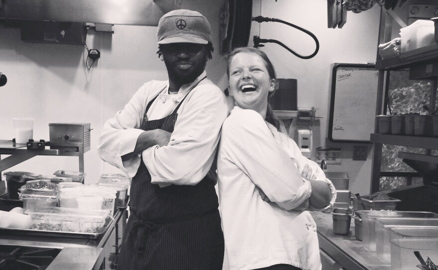 The writer, Rachael Cusick, pictured with chef Oneil Wilson, her coworker in the kitchen during a summer job as a line cook during the breakfast shift.