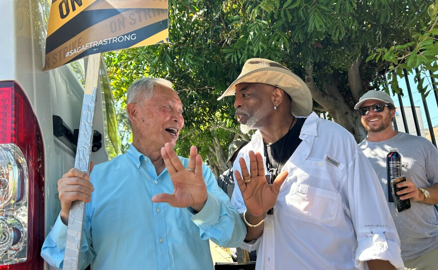 <em>Star Trek</em>'s George Takei and LaVar Burton on strike outside Paramount Pictures