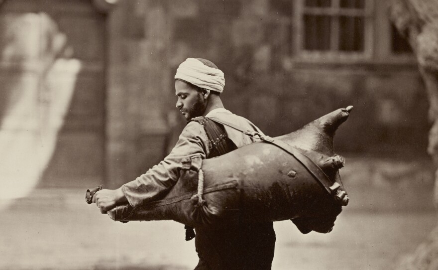 Water Carrier, Cairo, c. 1875.