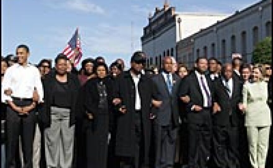 Barack Obama (far left) and Hillary Clinton (far right) pose March 4, 2007, in Selma, Ala., while re-creating a voting rights march from 1965.