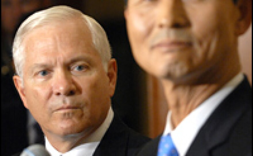 Secretary of Defense Robert Gates (left) and his South Korean counterpart, Kim Jang-Soo, hold a joint press conference after their bilateral meeting on the sidelines of the Singapore meetings.