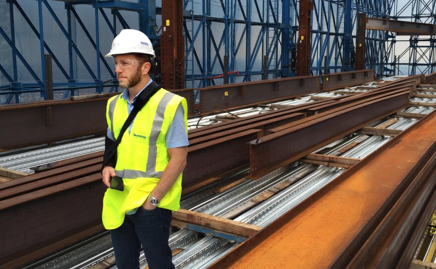 Jeremy Moss, who manages leasing for Silverstein Properties, stands on what will be the 75th floor of Three World Trade Center.