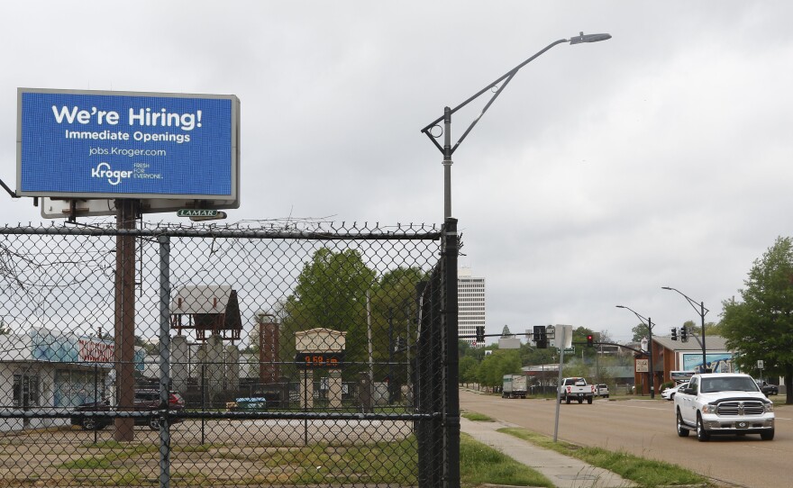 Kroger advertises it's hiring on a billboard in Jackson, Miss., on Monday.