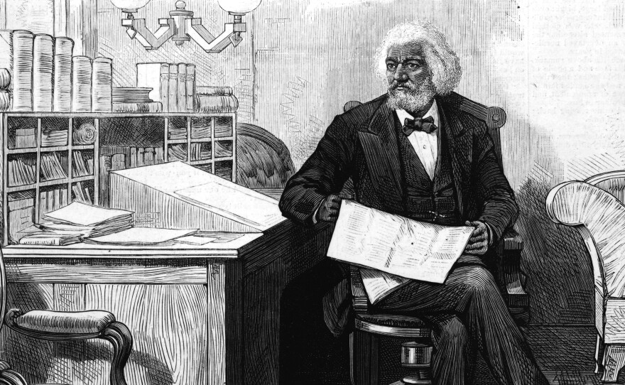 American writer, abolitionist and orator Frederick Douglass edits a journal at his desk, late 1870s. Douglass was acutely conscious of being a literary witness to the inhumane institution of slavery he had escaped as a young man. He made sure to document his life in not one but three autobiographies.