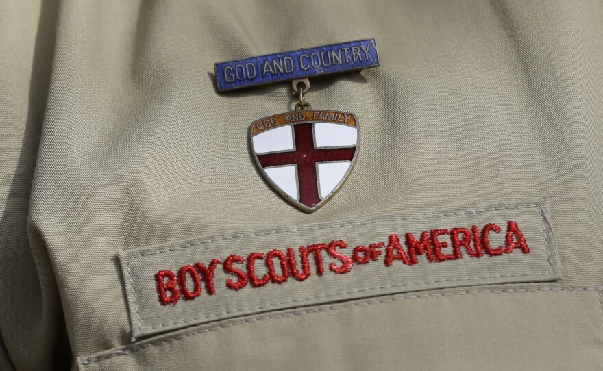 A close up of a Boy Scout uniform is photographed on Feb. 4, 2013, in Irving, Texas. On Tuesday, March 28, 2023, a federal district court judge upheld the approval of a $2.4 billion bankruptcy reorganization plan aimed at resolving tens of thousands of child sexual abuse claim against the Boy Scouts of America.