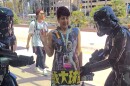 KPBS arts reporter Beth Accomando, seen in this photo being checked for contraband by Shadow Stormtroopers July 7, 2017, is a Comic-Con veteran of almost 50 years and she has some tips for avoiding Imperial entanglements and enjoying the pop culture convention.