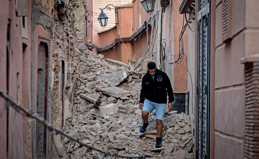 A resident navigates through the rubble following a 6.8-magnitude quake in Marrakesh on Saturday.