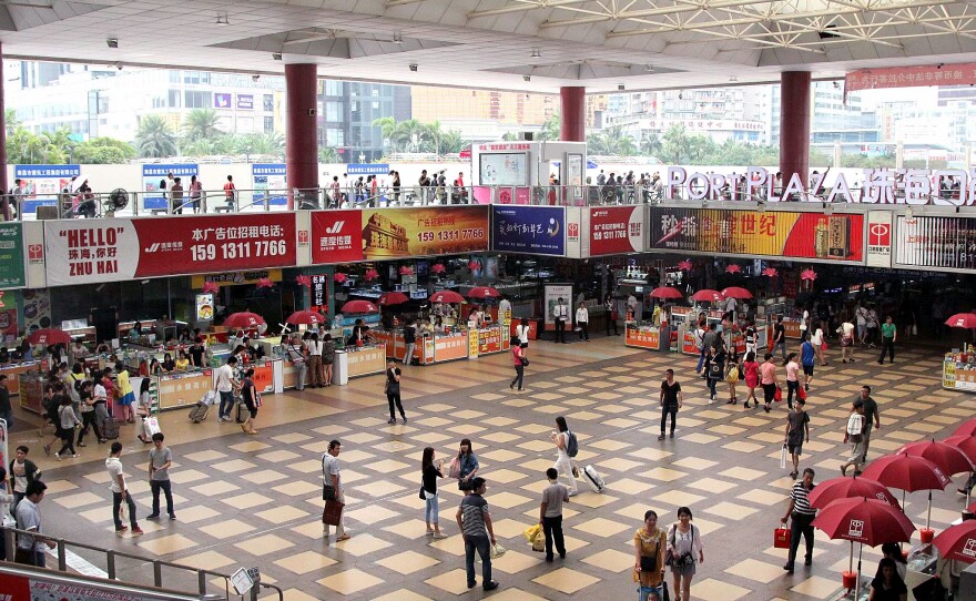 Kiosks in this mall in the Chinese city of Zhuhai specialize in moving large sums of money from the mainland into Macau, evading China's strict currency controls.