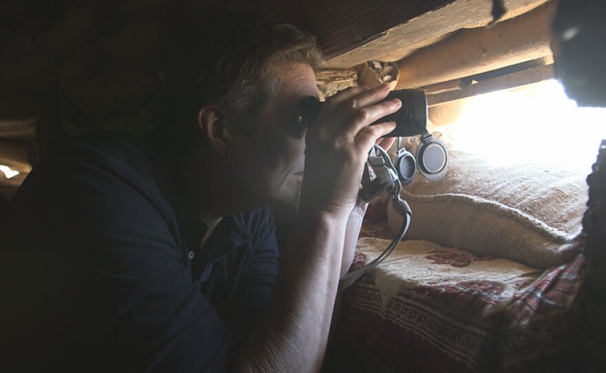Veteran FRONTLINE correspondent Martin Smith in a bunker about a half mile or less from ISIS in the town of Qayarah, Iraq – a key holding only recently taken back by coalition forces. FRONTLINE investigates the U.S.-led efforts to degrade and destroy ISIS. Reporting from Saudi Arabia, Iraq, Jordan and Turkey, FRONTLINE correspondent Martin Smith examines the successes, failures, and challenges of the fight, as ISIS loses ground in the region but strikes out abroad.