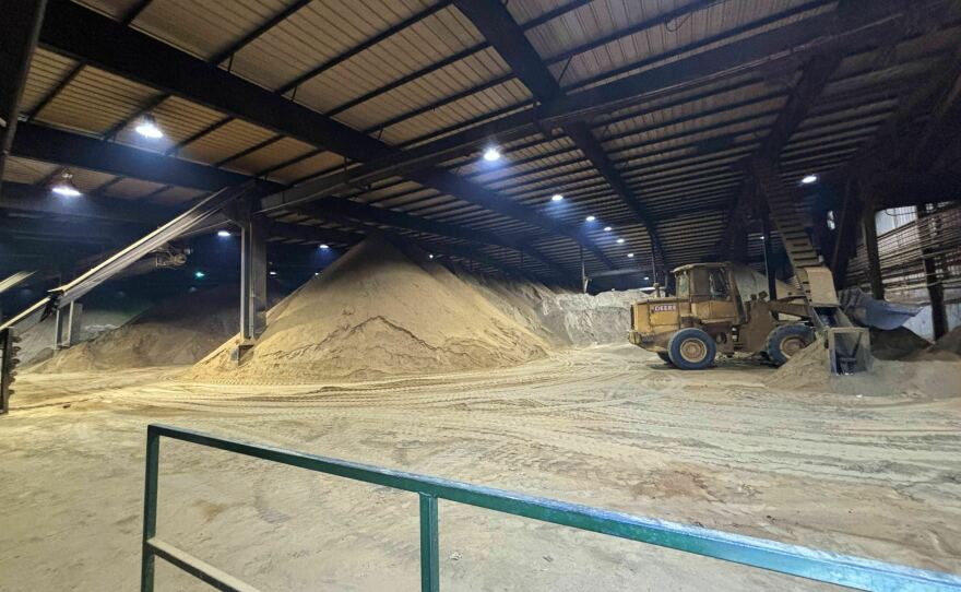 Piles of fish meal, made from menhaden, at Omega Protein's reduction plant in Reedville, Virginia in December. The fish meal is used in products like pet food and for feeding farm-raised salmon and shrimp.