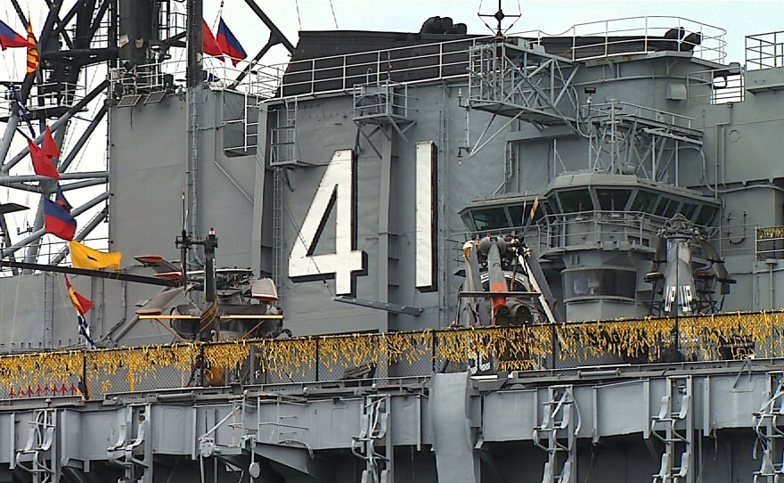 Yellow ribbons cover the USS Midway in honor of the Americans who lost their lives in the Vietnam War, April 23, 2015.