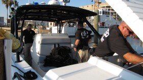 Homeland Security Marine Interdiction Agents prepare the boat to go out for a mission at Port Aransas, Texas. 