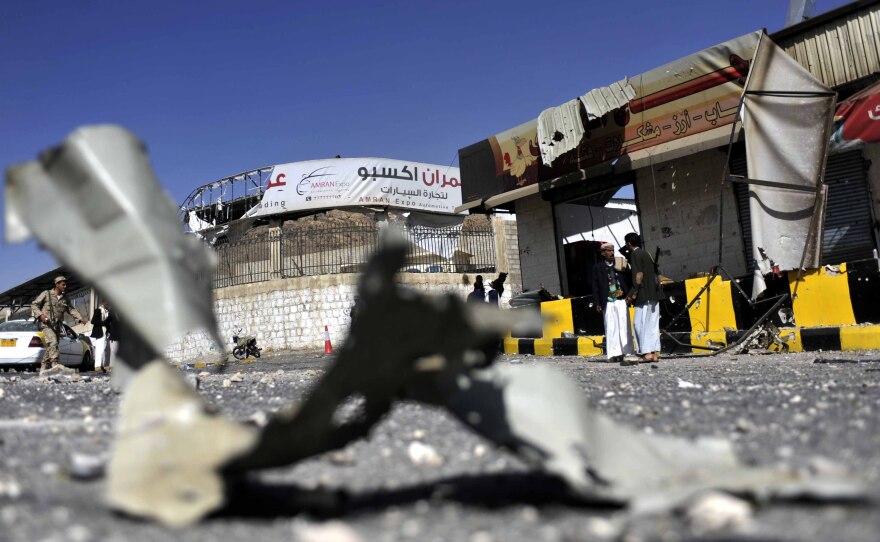 Houses of local residents are seen damaged in clashes that erupted between presidential guards and Shiite Houthi fighters in Sanaa, Yemen, on Tuesday.