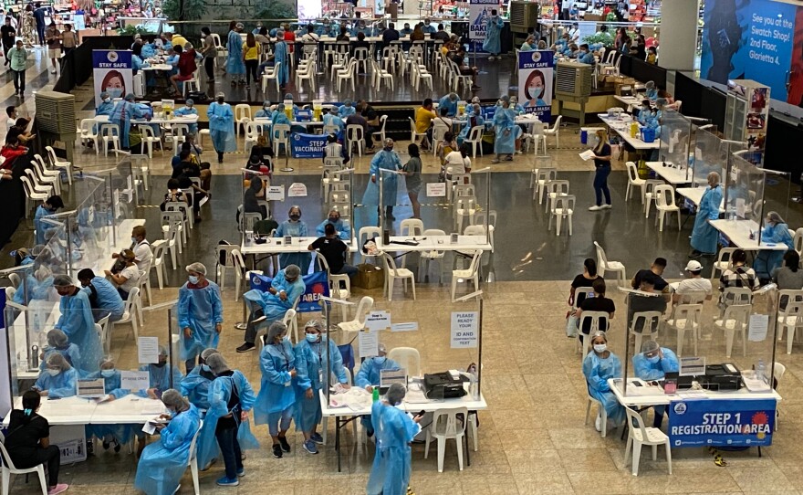 A scene from the Glorietta Shopping Mall vaccination effort. Even after its successful vaccination drive the country has inoculated just over a third of its 110-million people. By contrast, Vietnam has immunized 55% of its population, and Cambodia has fully vaccinated 81%.
