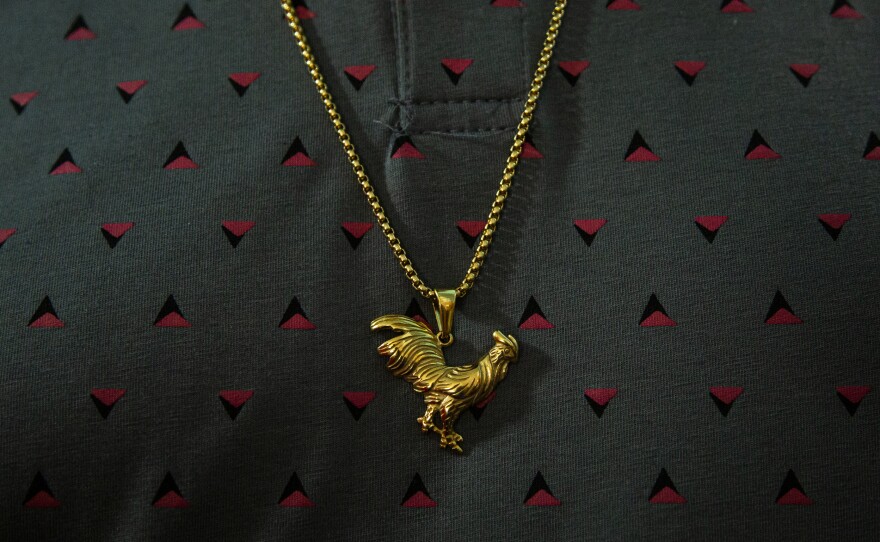 A cockfighter's necklace at the Gallera Borinquén.