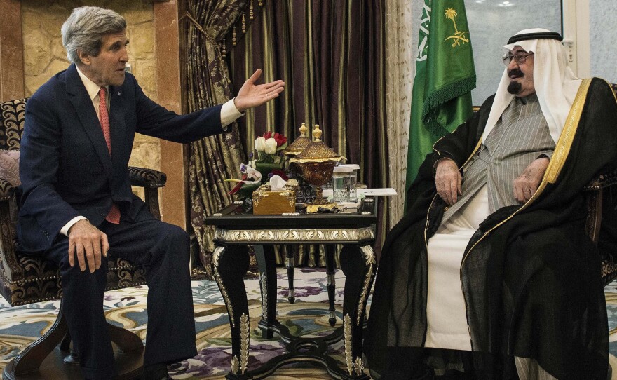 Secretary of State John Kerry meets Saudi Arabia's King Abdullah at his desert encampment in Rawdat al-Khuraim on Jan. 5, 2014. The king died on Friday at age 90.