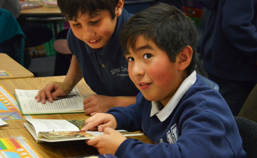 Miguel Figueroa (R) and Diego Salazar (L) reading in Cheri Kuykendall's fourth-grade class during their independent reading time. Students had just done a close reading of a text; now they are able to choose the books they want to read.