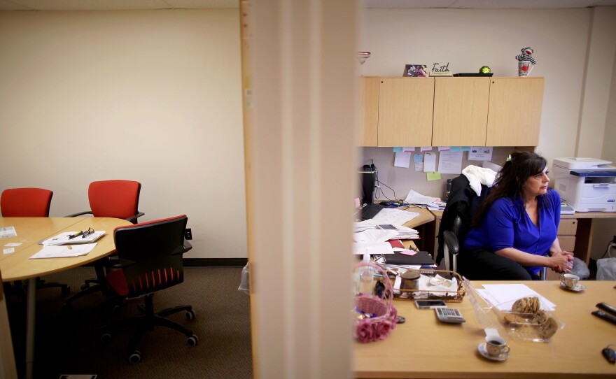 Corine Dehabey, a Syrian American, is the resettlement coordinator for Us Together in Toledo, where she places Syrian refugees in housing and helps them adapt to their new lives in the United States.